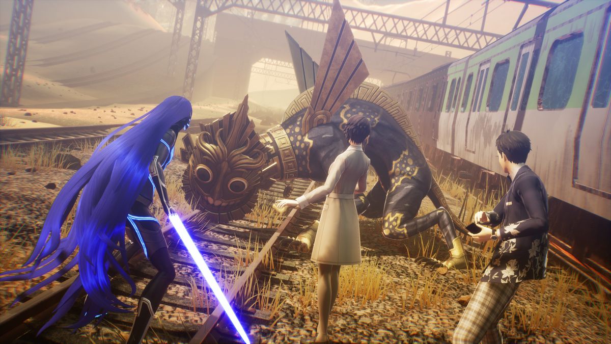 Three Shin Megami Tensei 5: Vengeance characters face away from the viewer, their weapons drawn. Facing towards them (and the viewer) is a monster wearing a grinning dragon-like mask