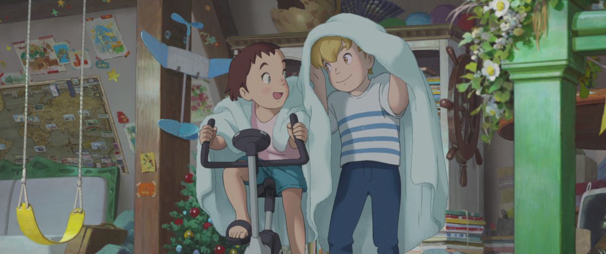 A brown-haired anime girl and a blond-haired anime boy playing beneath a blanket in a colorful attic in The Imaginary.