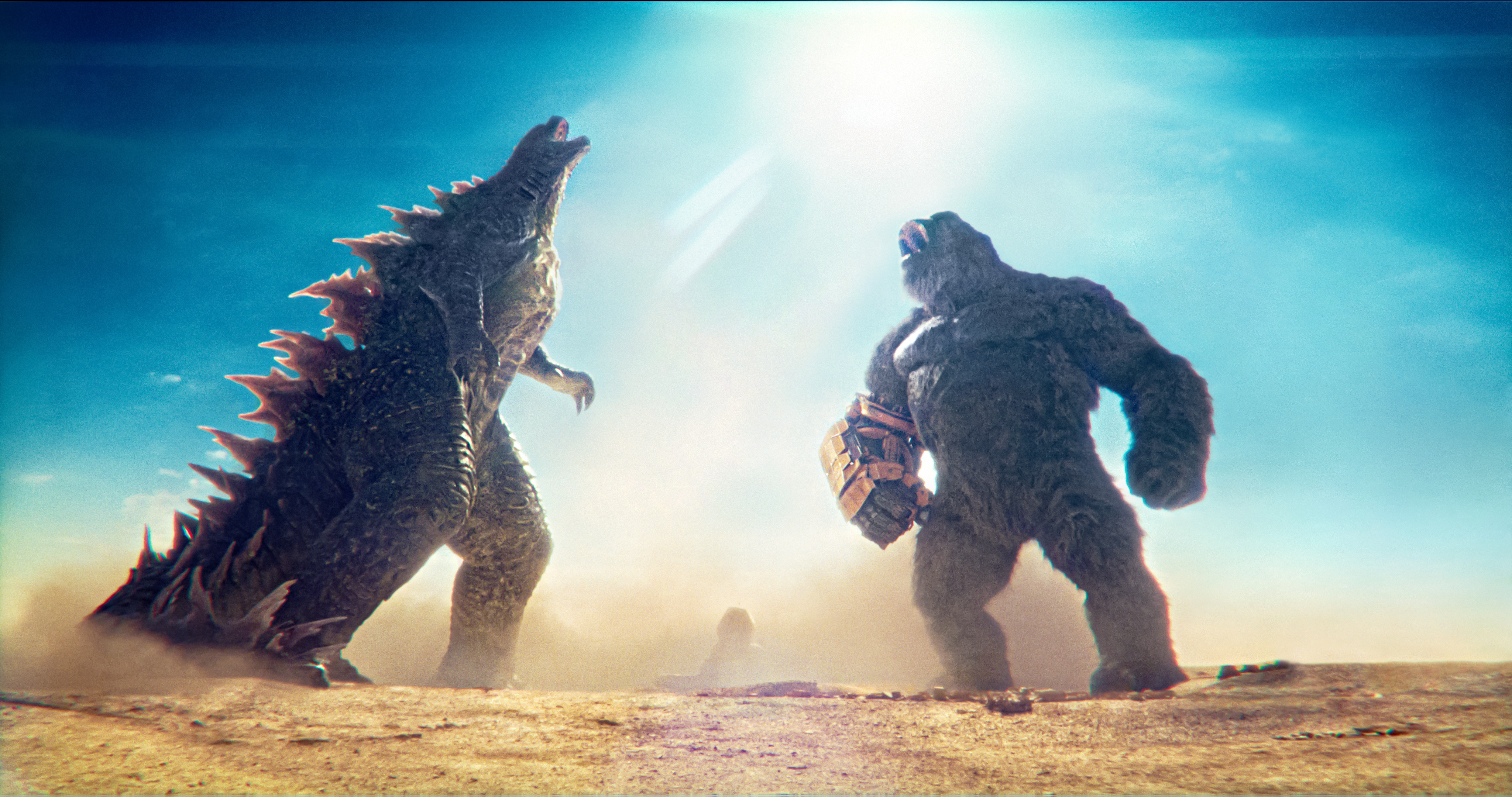 Godzilla and King Kong roar at the sky together in Godzilla x Kong: The New Empire