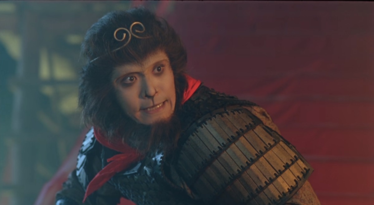 A humanoid monkey looks toward the camera wearing armor and a red handkerchief in A Chinese Odyssey Part Two: Cinderella