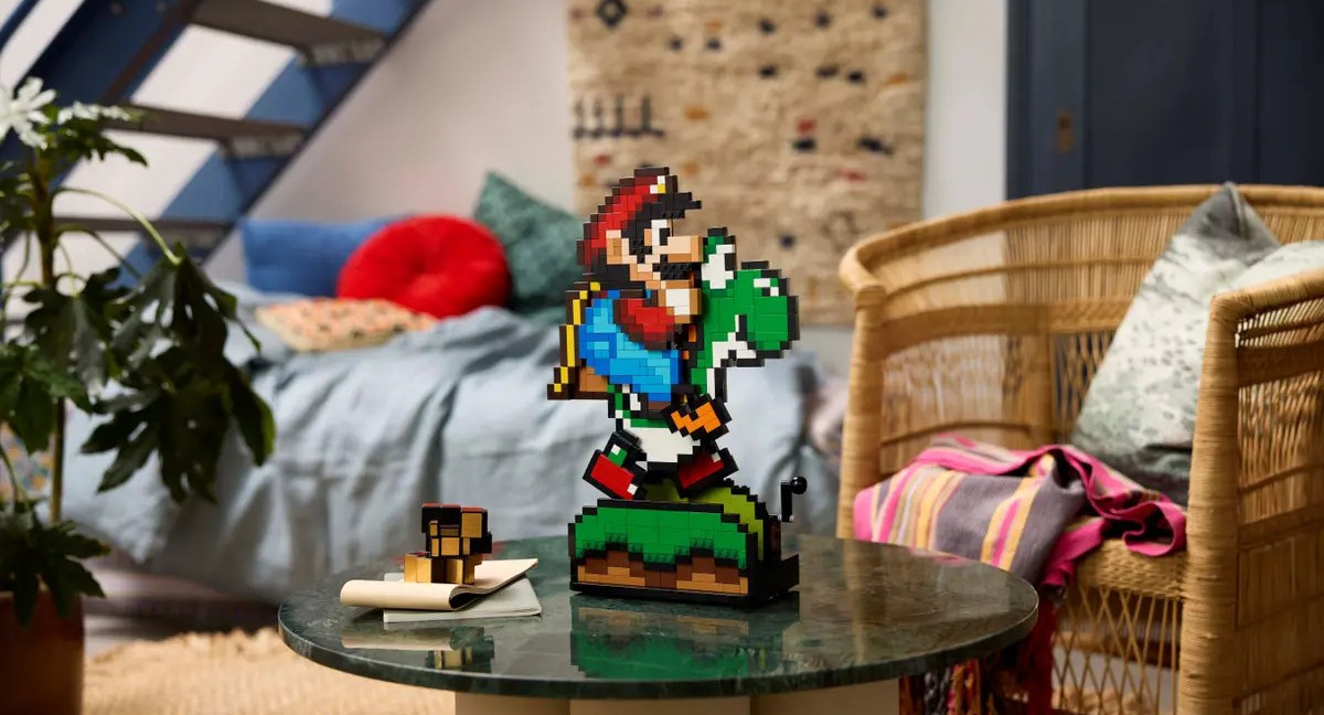 A stock image of the fully assembled Lego Super Mario World: Mario &amp; Yoshi set on a coffee table