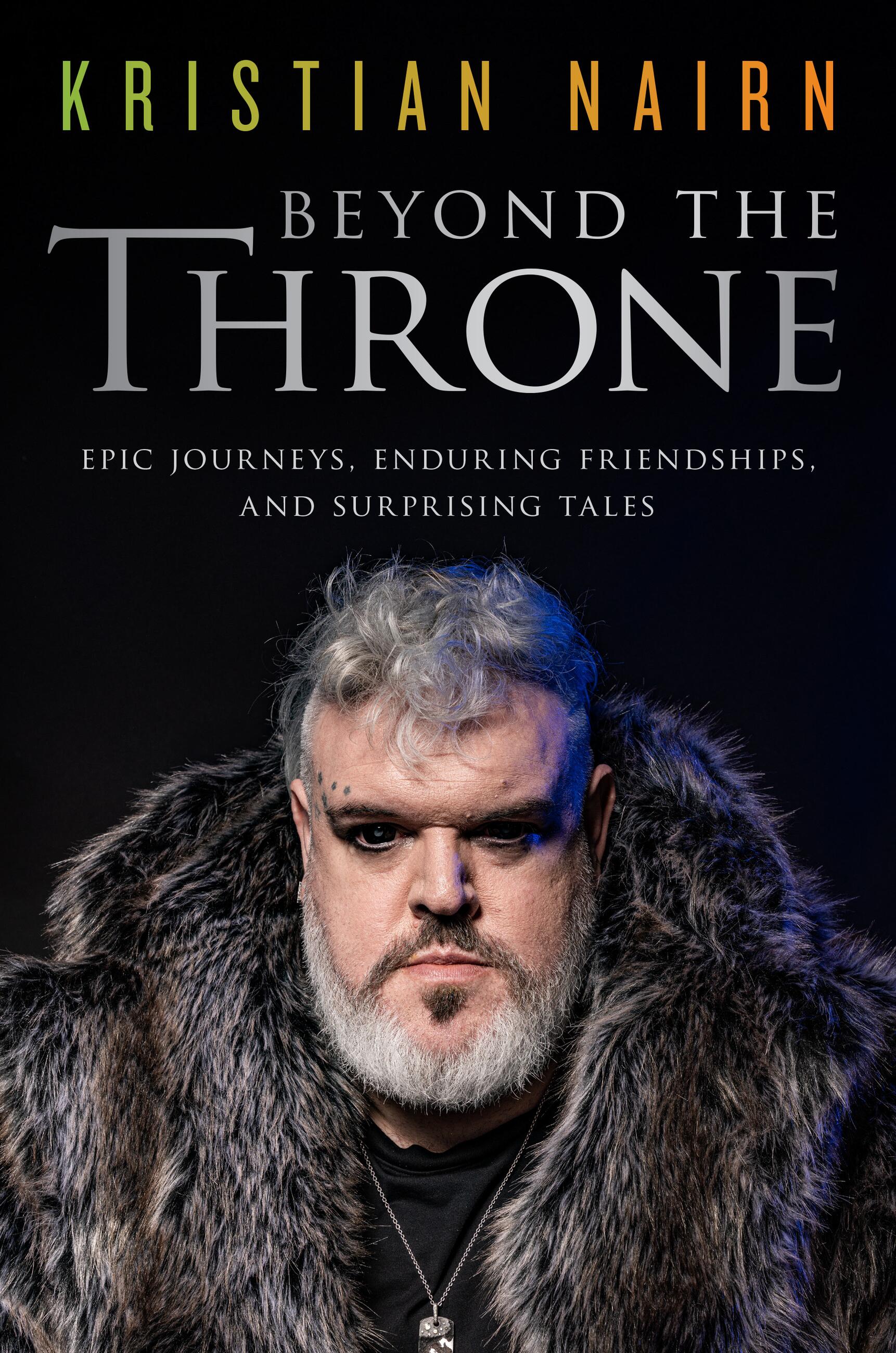 The cover of Kristian Nairn’s memoir Beyond the Throne, showing Nairn dressed in dark fur and heavy eyeliner as a dramatized version of his character Hodor from Game of Thrones