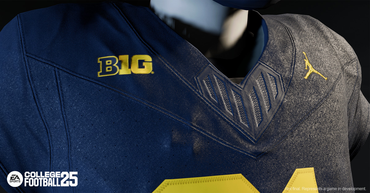 An extreme close-up of a navy blue and yellow football uniform for the University of Michigan in EA College Football 25.