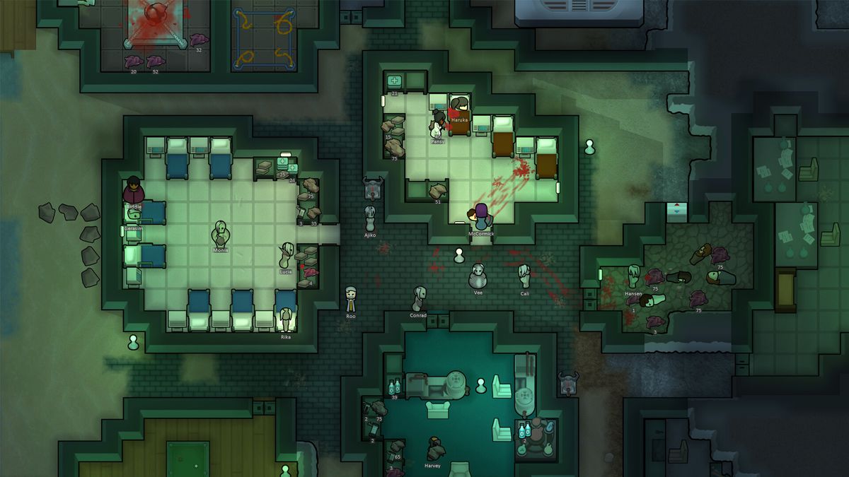A colony in RimWorld, showing the player’s medical facilities and corpse storage rooms. It’s a grim scene, with an eerie light over the colony.
