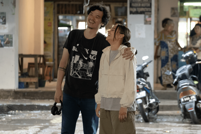 Timo Tjahjanto and Aurora Ribero smiling and laughing on set of the Shadow Strays