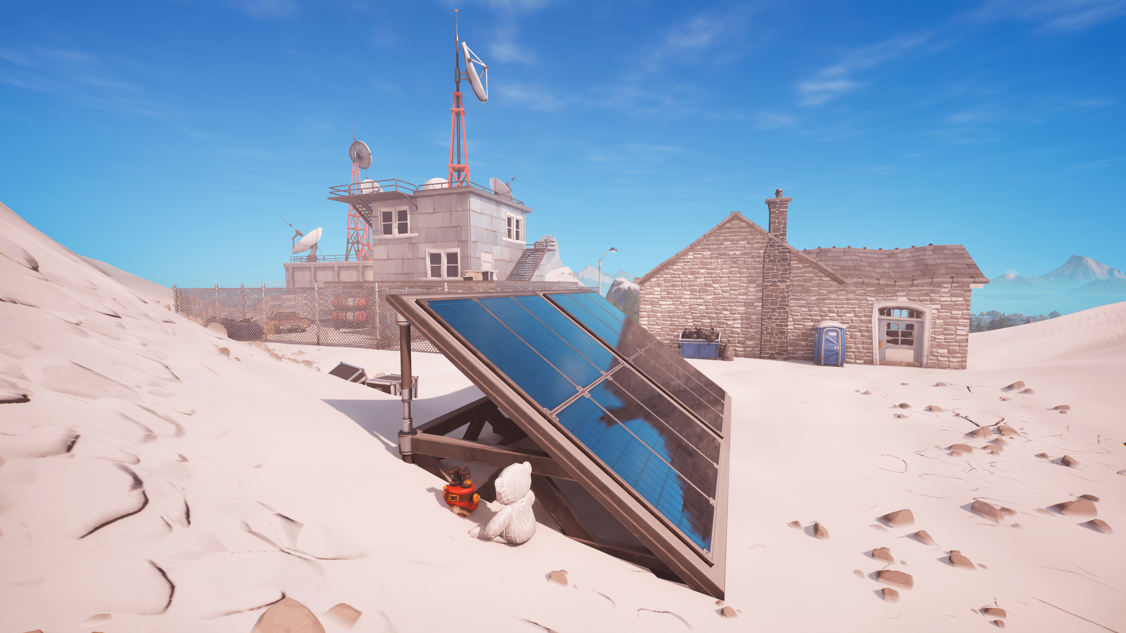 A gnome is stuck in the snow by a solar panel in Fortnite remix