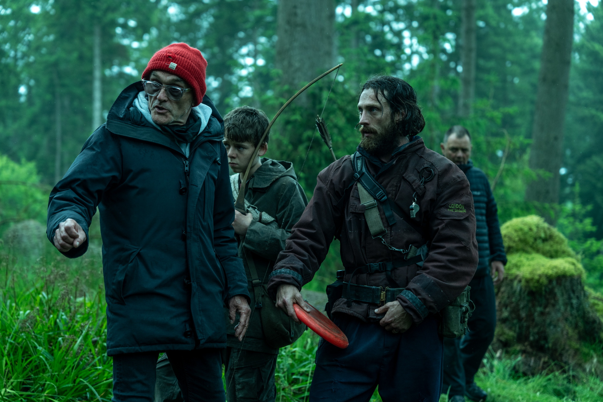 Danny Boyle, Alfie Williams, and Aaron Taylor-Johnson on the forest set of 28 Years Later