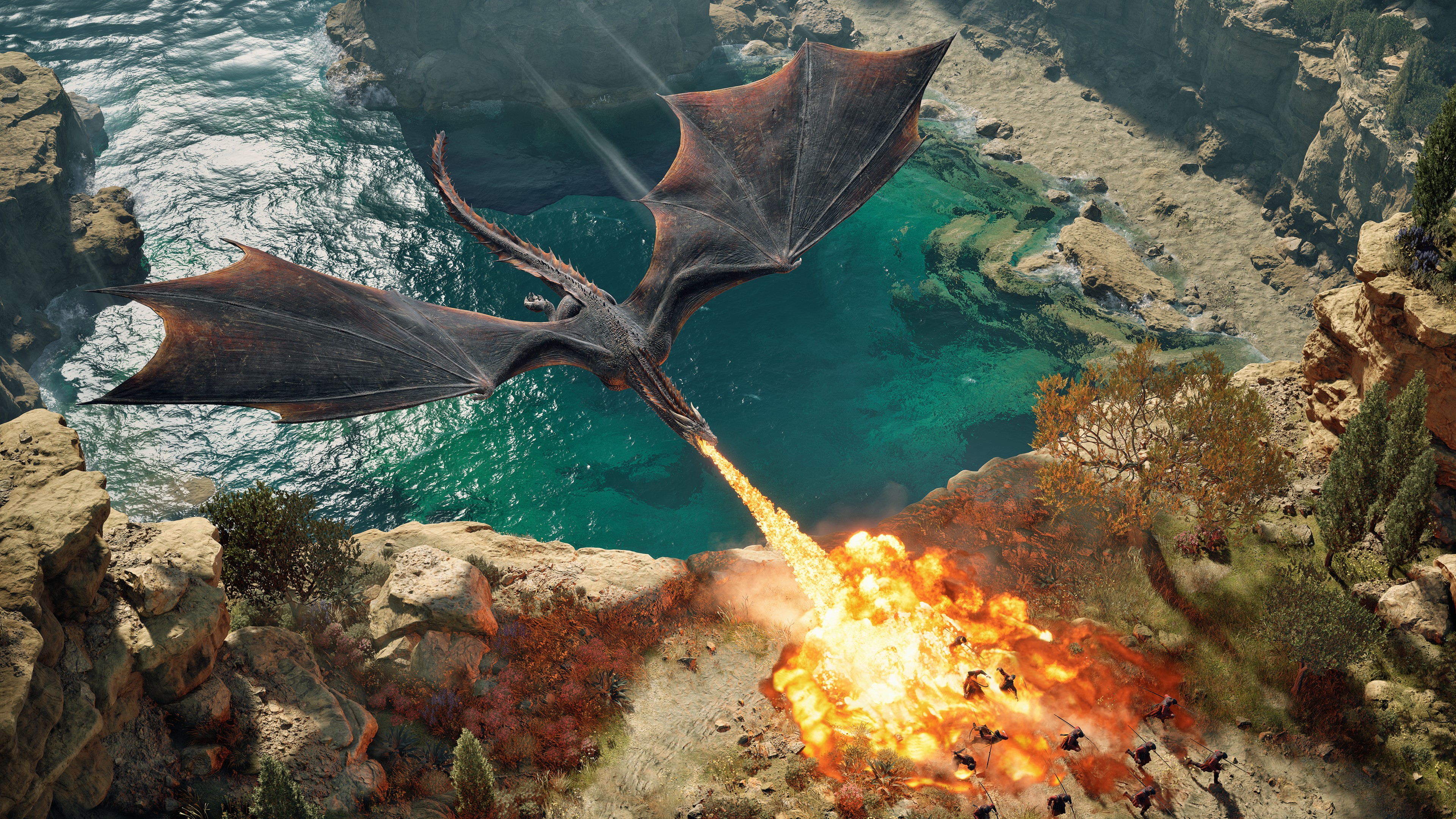 A dragon from Game of Thr ones: War for Westeros as it lights other ground units on fire with its breath