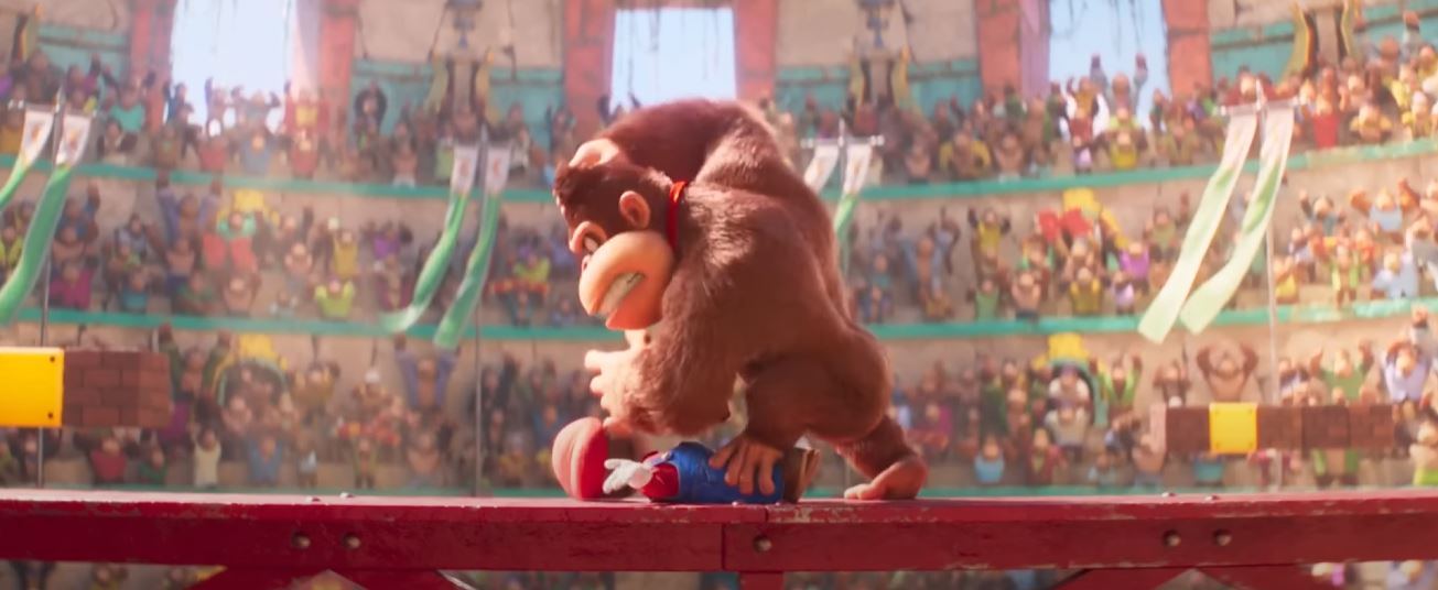 Donkey Kong in the Super Mario movie pummels the plumber with his fists. 