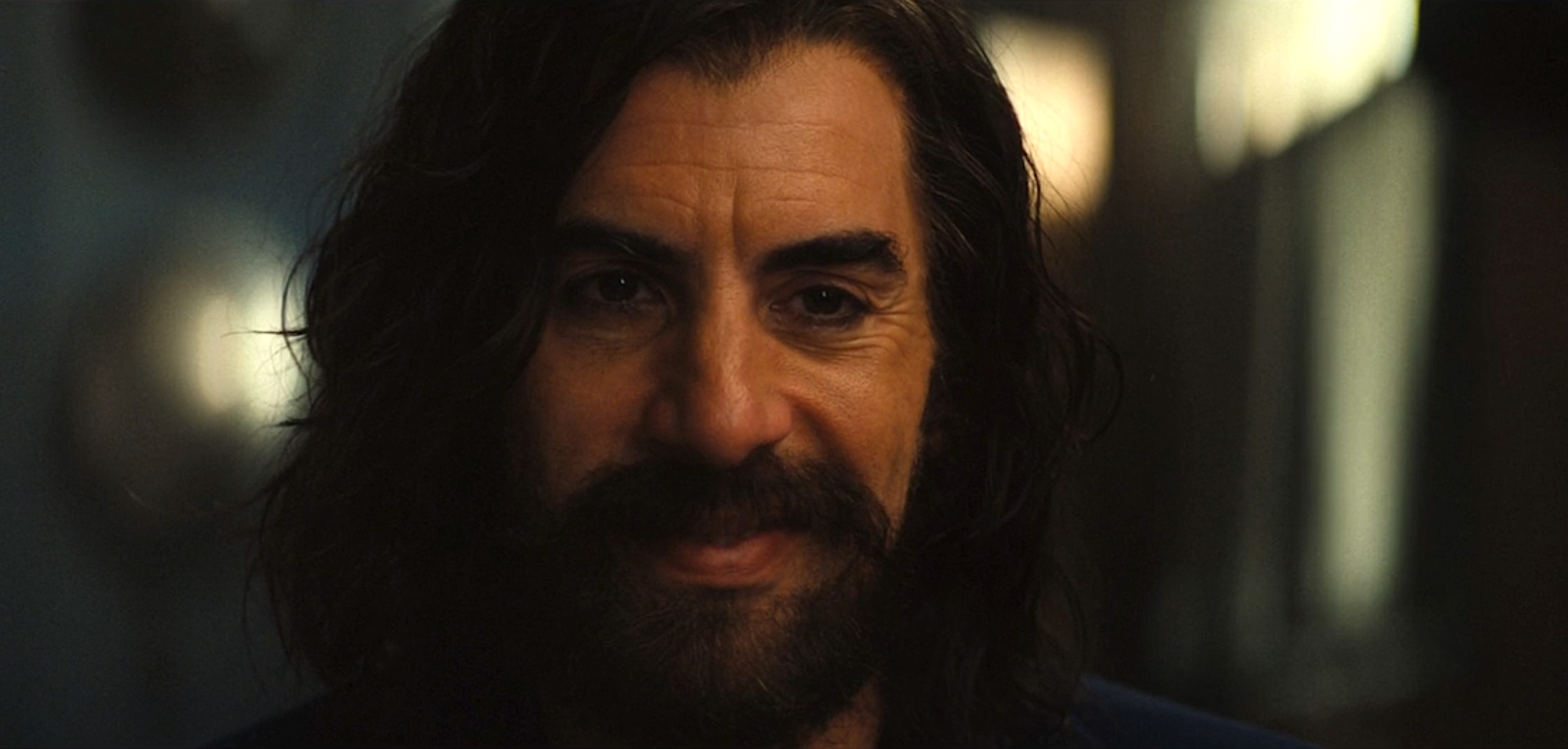 Sacha Baron Cohen as Mephisto, a dark-haired, heavily mustached and bearded man in black, in Marvel Studios’ Ironheart
