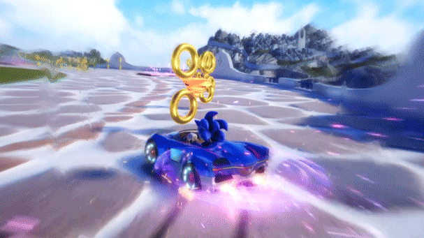 Sonic drifts around multiple bends, picking up rings