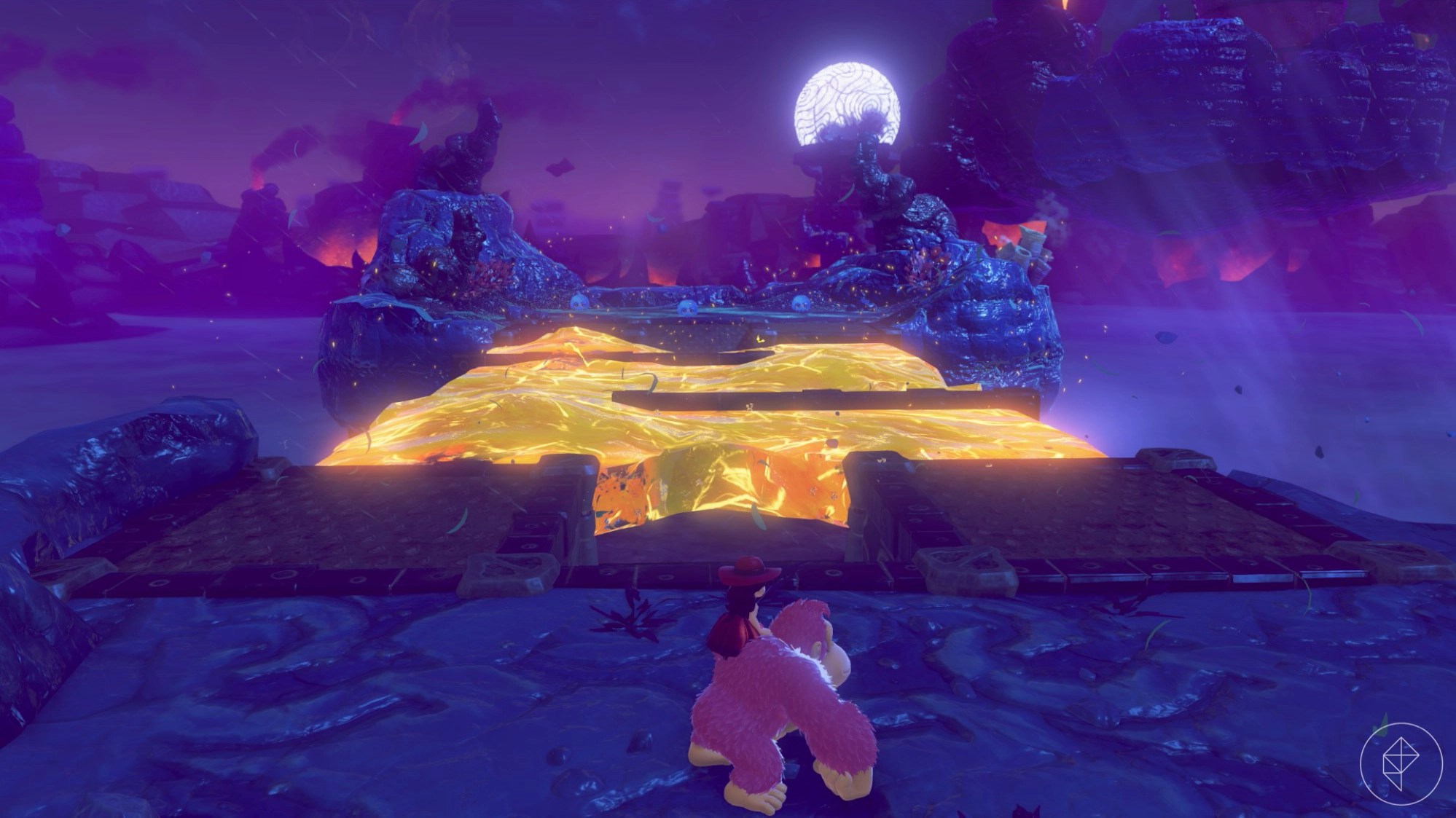 Three fragment pieces sit sadly on the other side of a lava-filled passage in Donkey Kong Bananza.