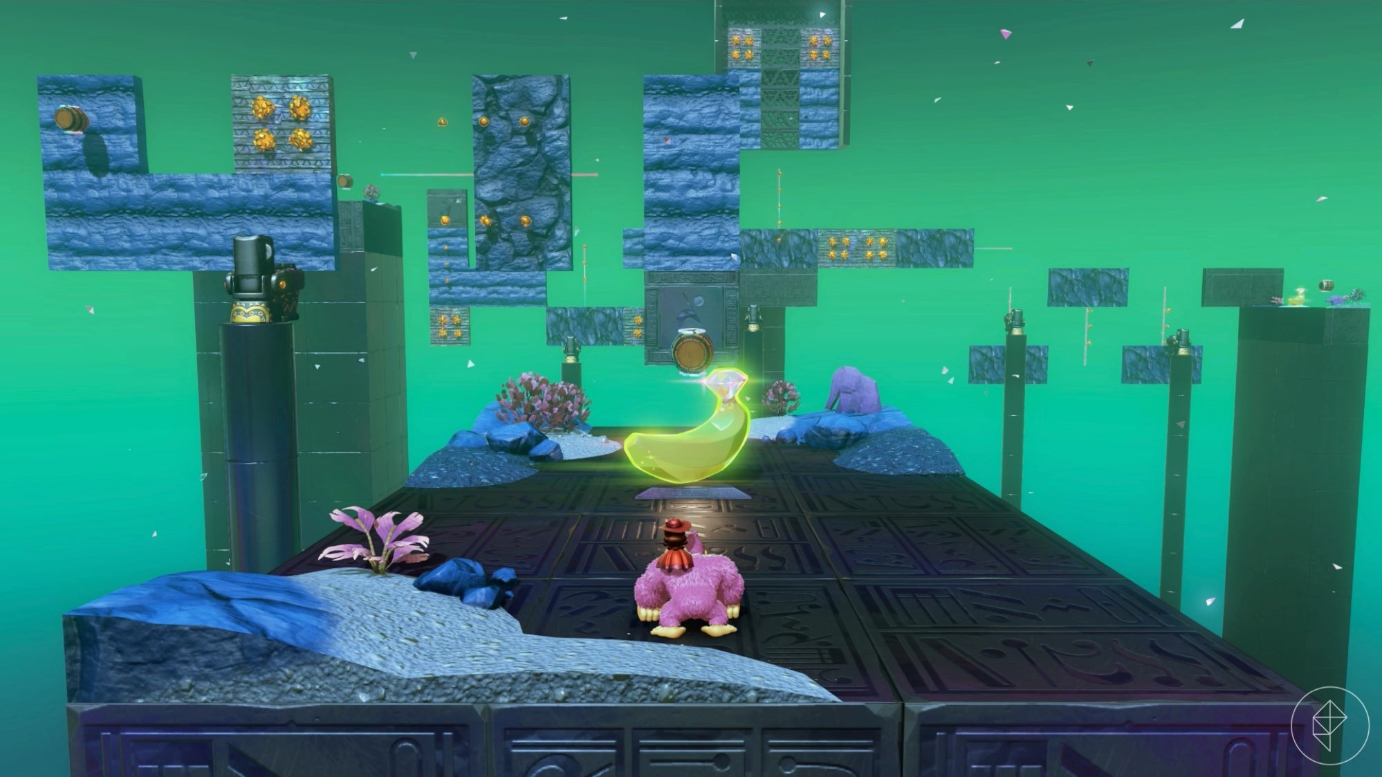 Donkey Kong standing in front of a golden banana that has a lot of moving walls behind it.