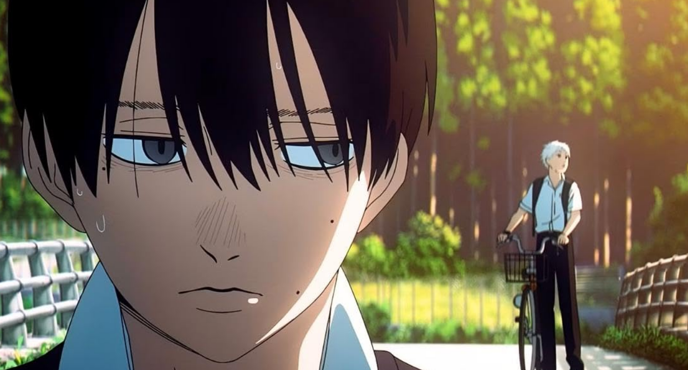 A young man with dark hair over his eyes glances behind him. Behind him, another young man with white hair and riding a bike, struggles to catch up. From The Summer Hikaru Died.