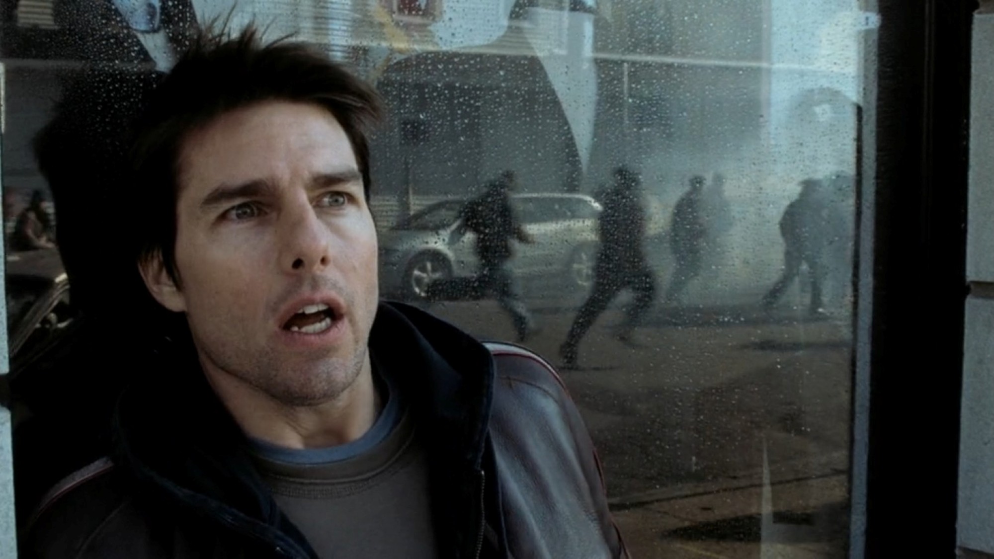 Ray (Tom Cruise) pauses to catch his breath while fleeing attacking aliens in the 2005 film War of the Worlds. 