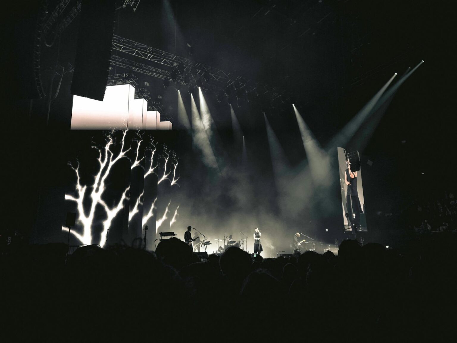Illuminated concert stage with dramatic lighting effects and empty venue