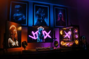Modern gaming setup with colorful LED lighting and multiple monitors in a dark room