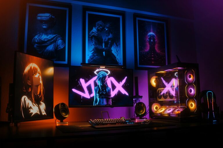 Modern gaming setup with colorful LED lighting and multiple monitors in a dark room
