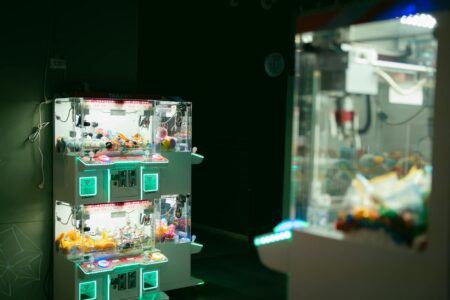 Why Nintendo’s Subscription Box Service Is Attracting Adult Collectors Collection of gaming merchandise and collectible items displayed on shelf