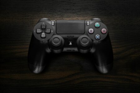 Close-up view of a modern gaming controller showing advanced haptic technology components