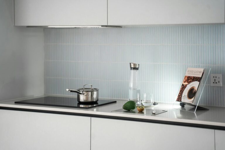 Why Zelda Cookbook Sales Are Outpacing Traditional Gaming Guides Open cookbook on kitchen counter with cooking ingredients and utensils around it