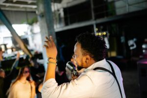 Why Major Streamers Are Launching Gaming-Focused Podcast Networks Professional podcast microphone in studio setting representing gaming audio content creation