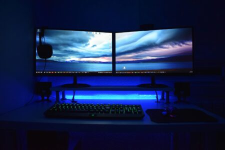 Modern gaming PC setup with monitor, keyboard and mouse on desk