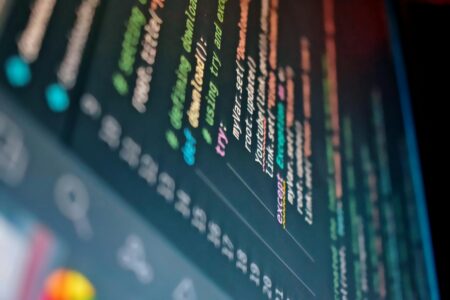 Developer working on visual programming interface with node-based scripting system