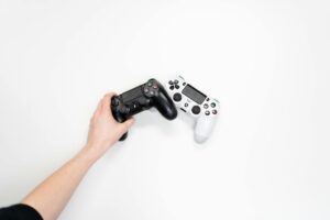 How PlayStation’s New Accessibility Controller Is Competing with Xbox’s Adaptive Controller Hands holding a customizable gaming controller showing accessible design features
