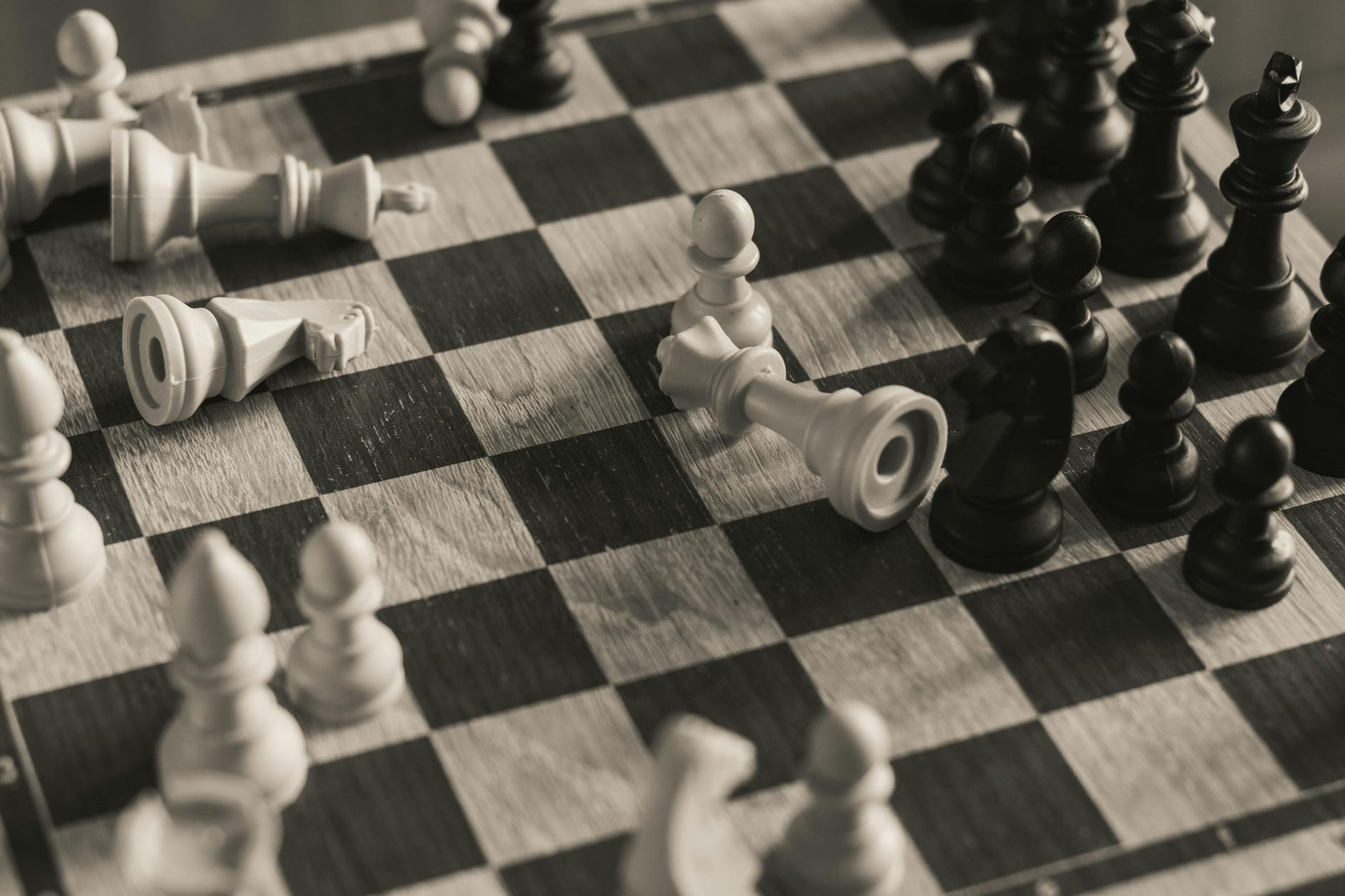 Chess pieces on board showing strategic positioning and tactical gameplay elements