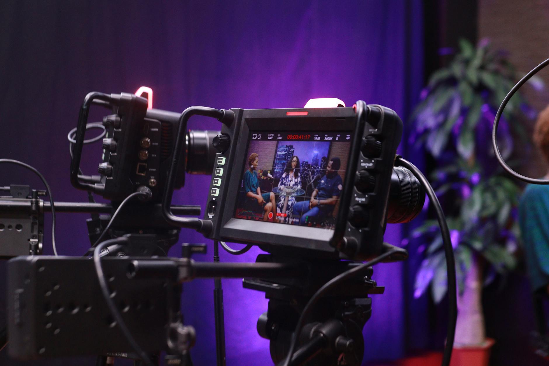 Professional video production studio with cameras and lighting equipment
