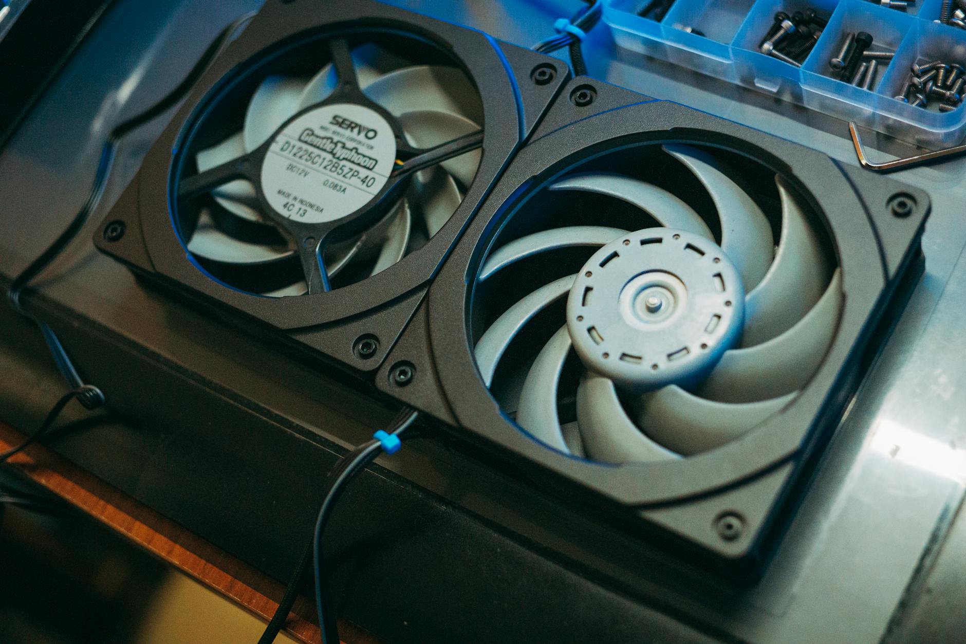 Close-up view of laptop cooling fan and heat sink components