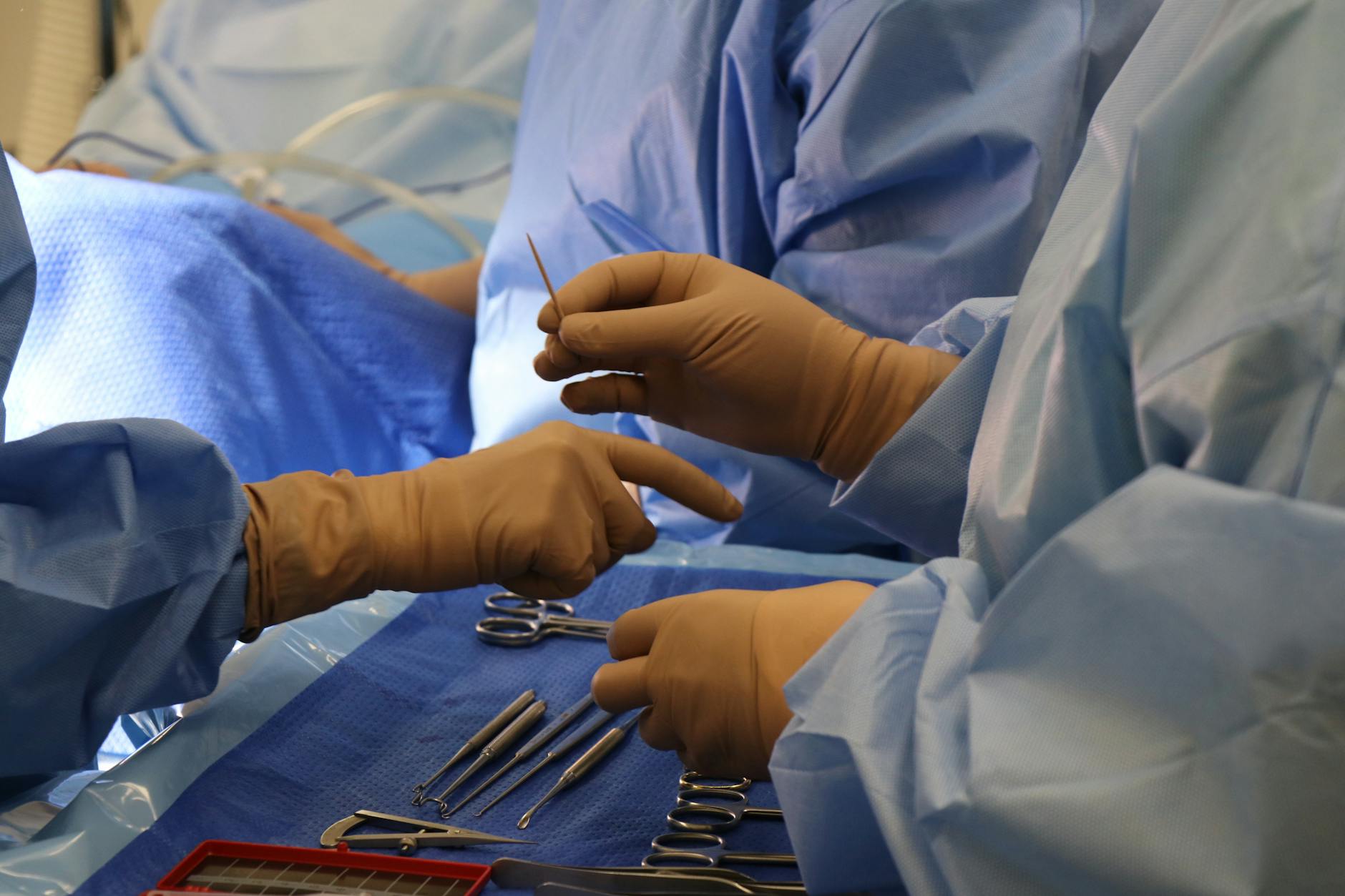 Surgeon's hands demonstrating precise medical procedure technique