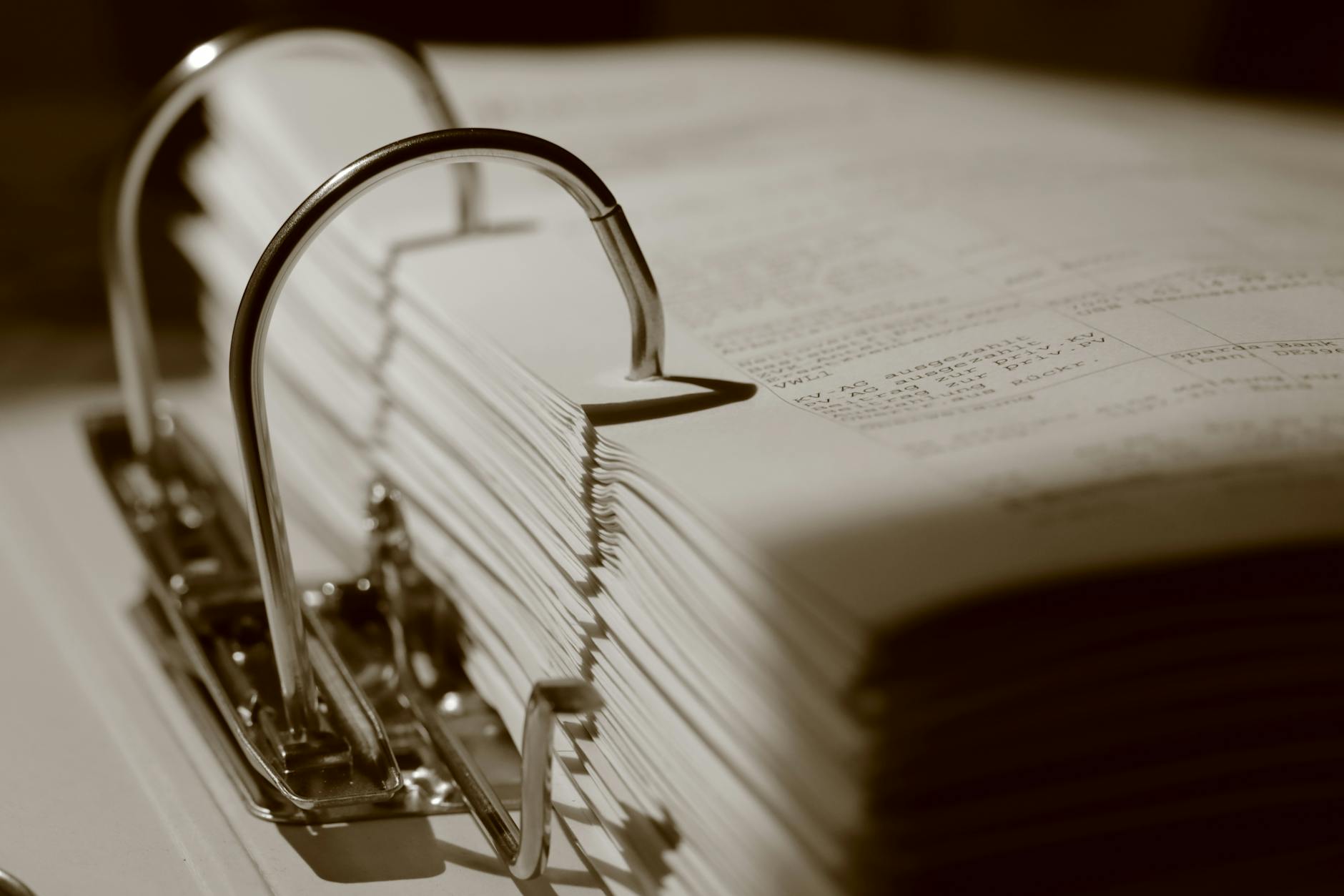 Legal patent documents and paperwork spread on office desk