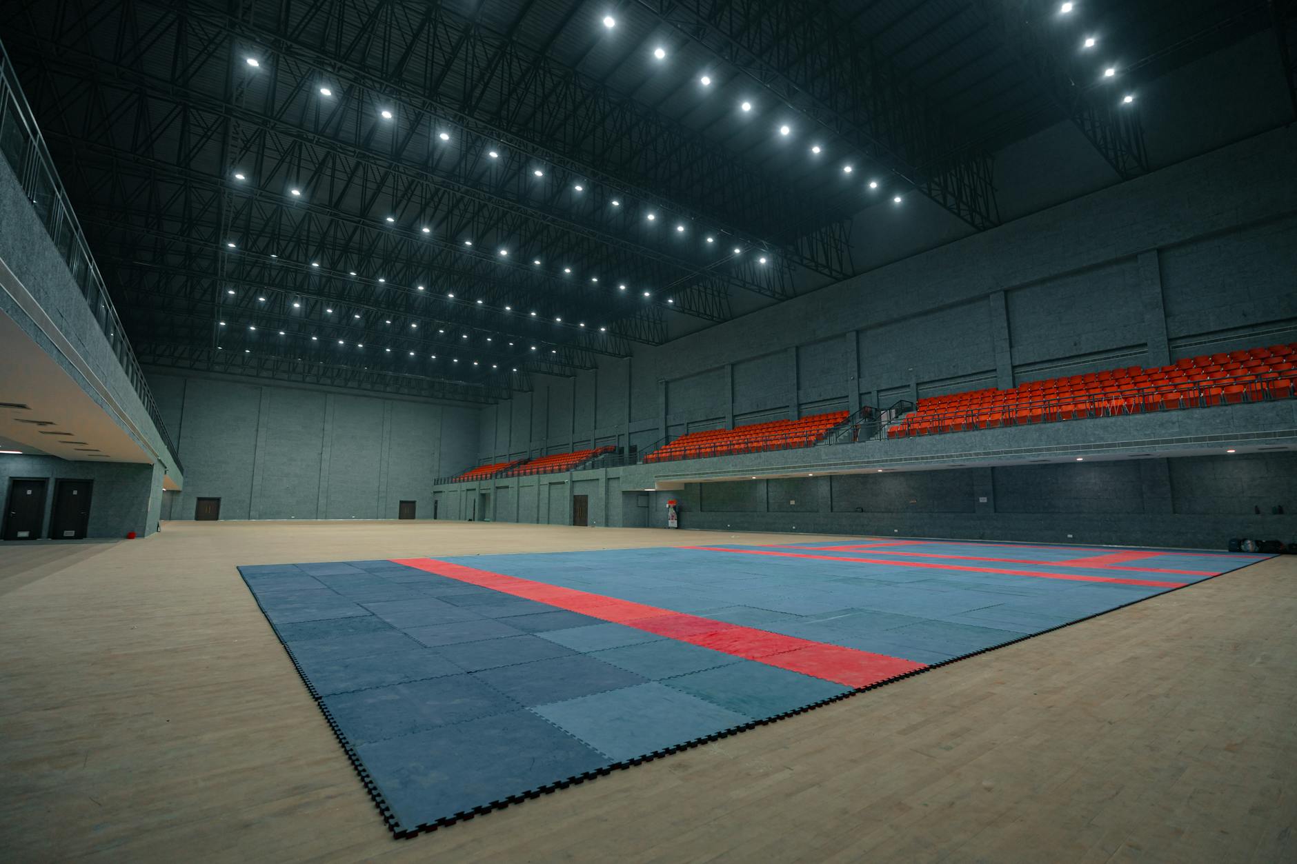 Busy convention hall filled with gaming tournament participants and spectators