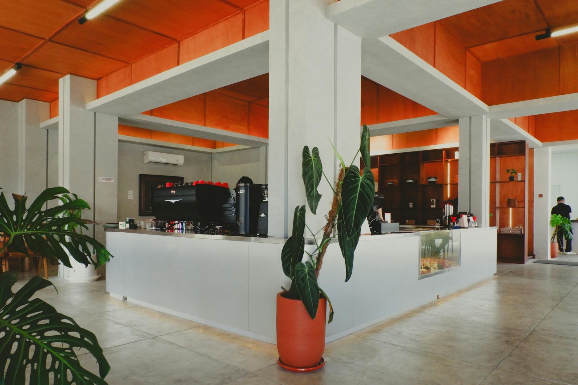 Stylish modern cafe interior with comfortable seating and ambient lighting, designed for social gatherings