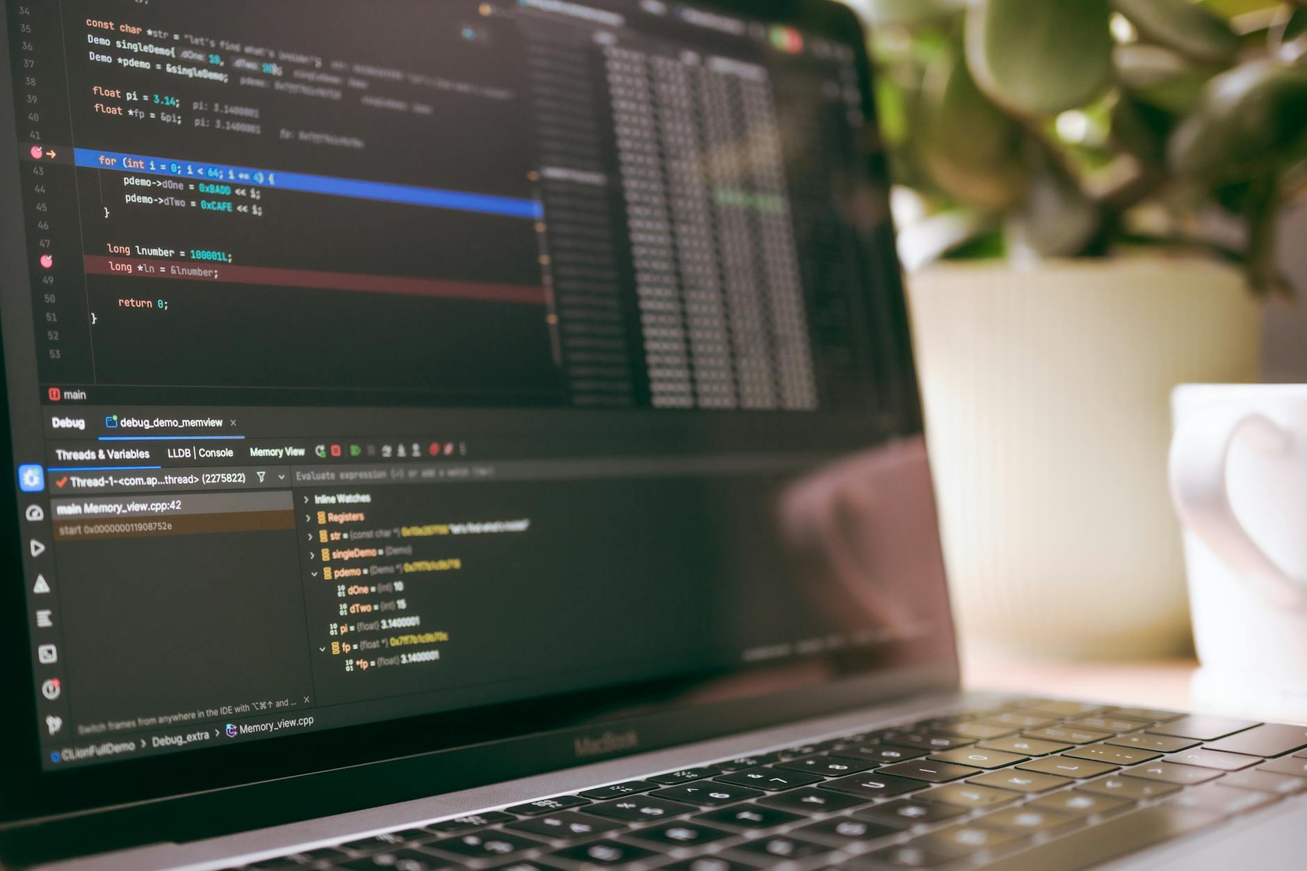Developer working on software code for gaming applications