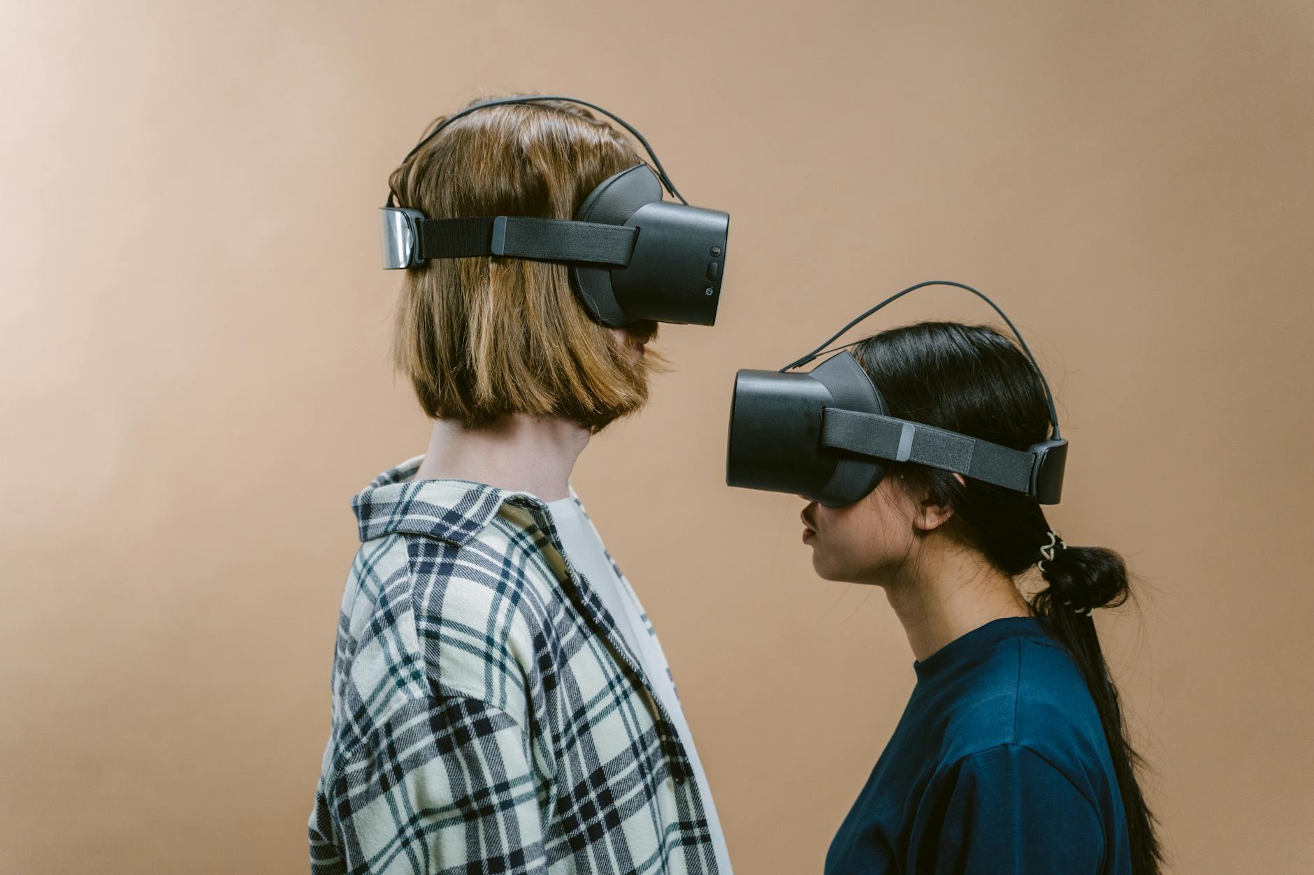 Multiple people using VR headsets in modern gaming environment