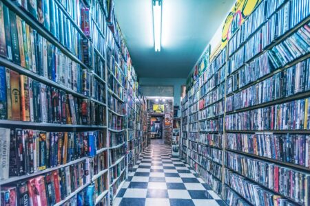 Video game retail store shelves with Nintendo Switch game cases on display