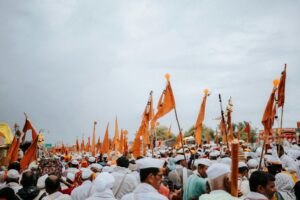 Large crowd gathered at an outdoor festival event