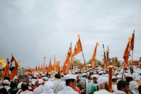 Large crowd gathered at an outdoor festival event