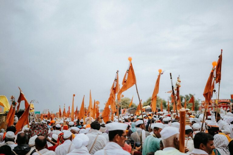 Large crowd gathered at an outdoor festival event