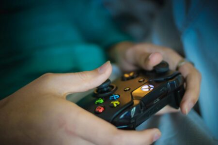 A game controller resting on a surface, representing console gaming hardware