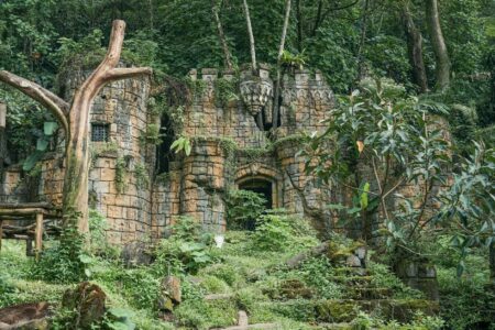Stone ruins surrounded by dense jungle foliage, evoking an adventurous platformer environment