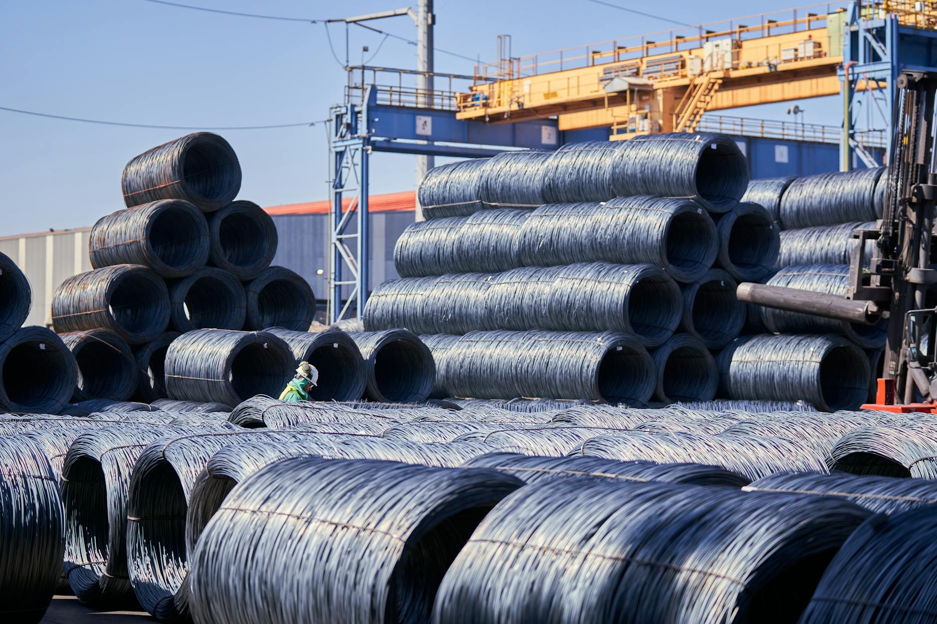 Industrial manufacturing facility with production equipment and conveyor systems