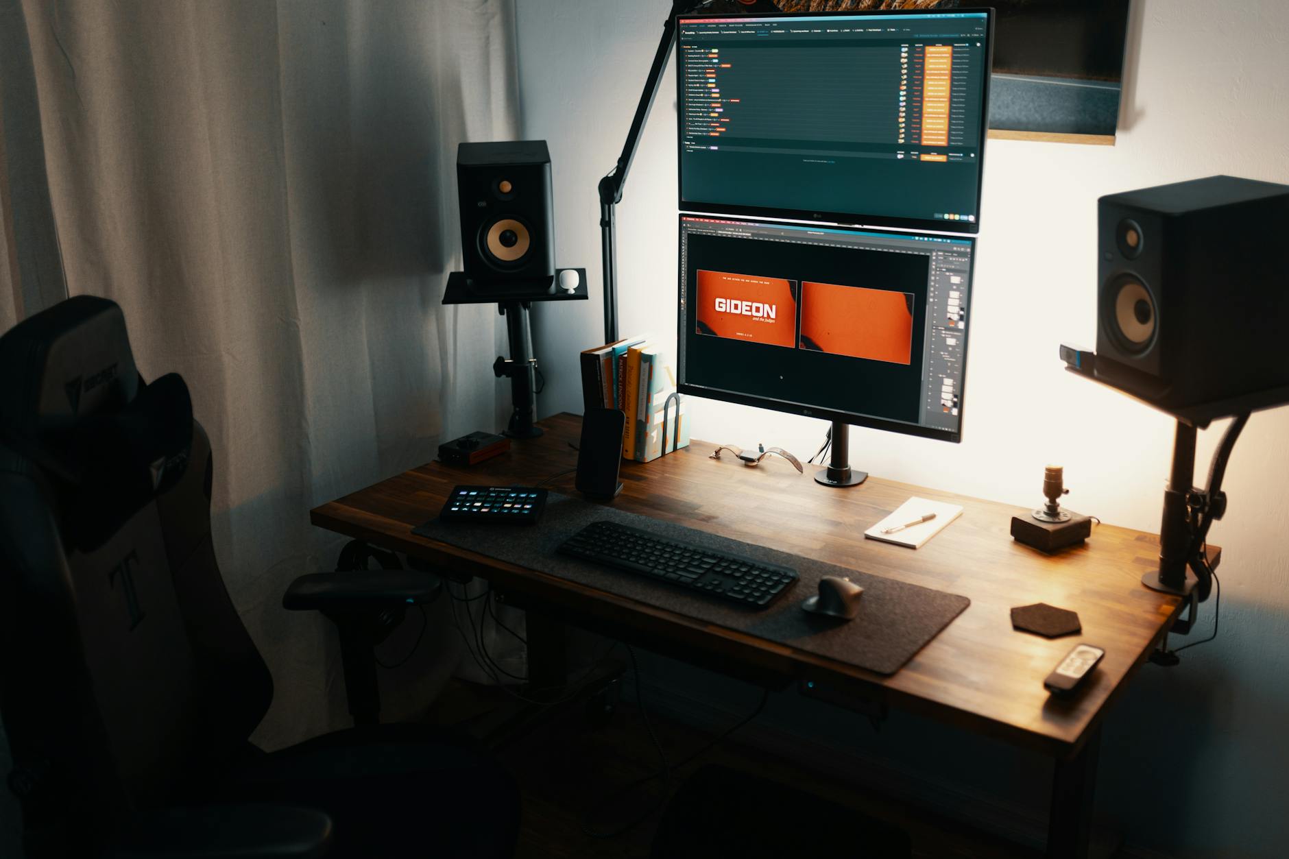 Animation studio workspace with drawing tablets and character sketches on monitors