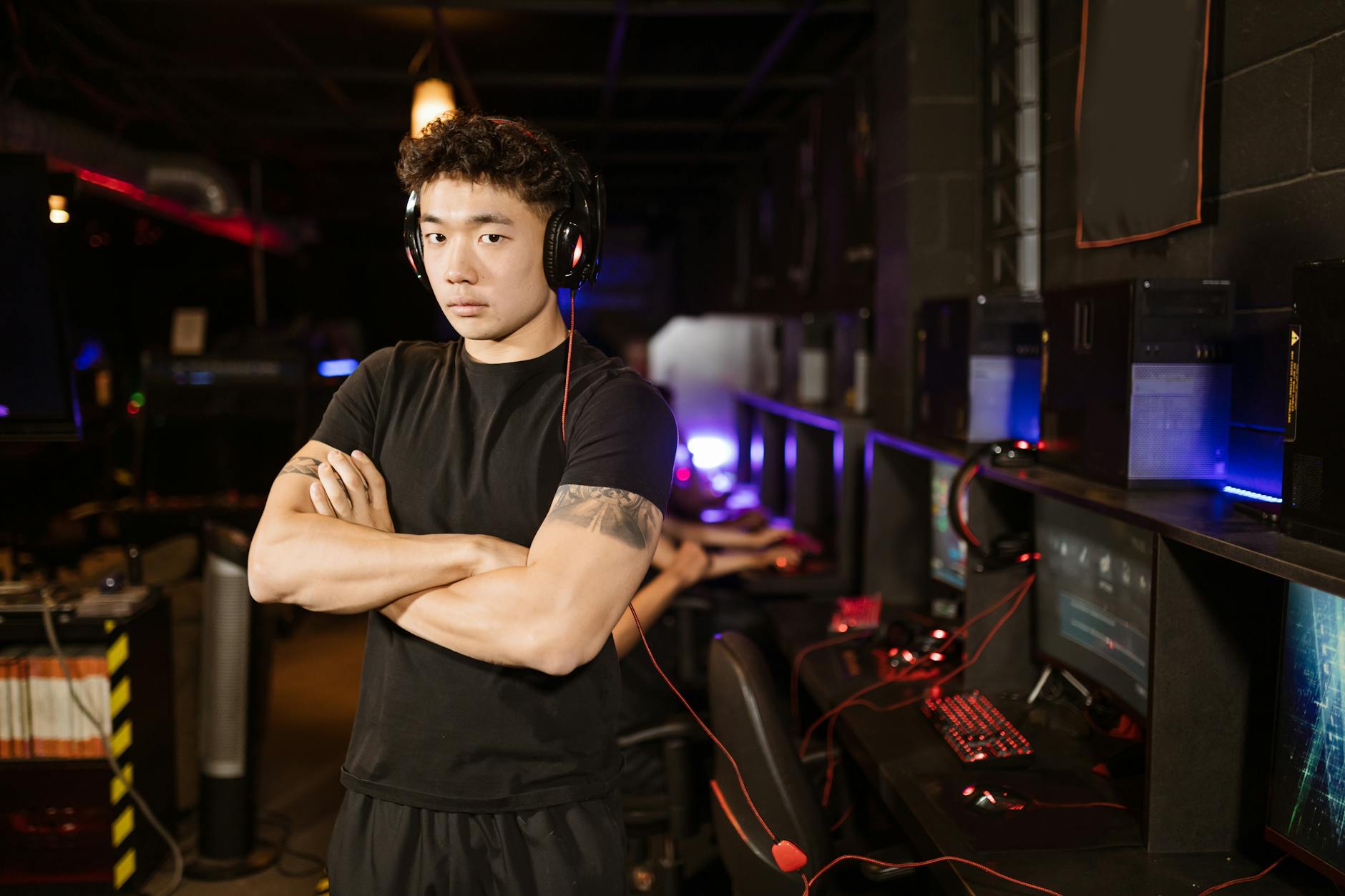 Large esports tournament arena filled with spectators watching competitive gaming