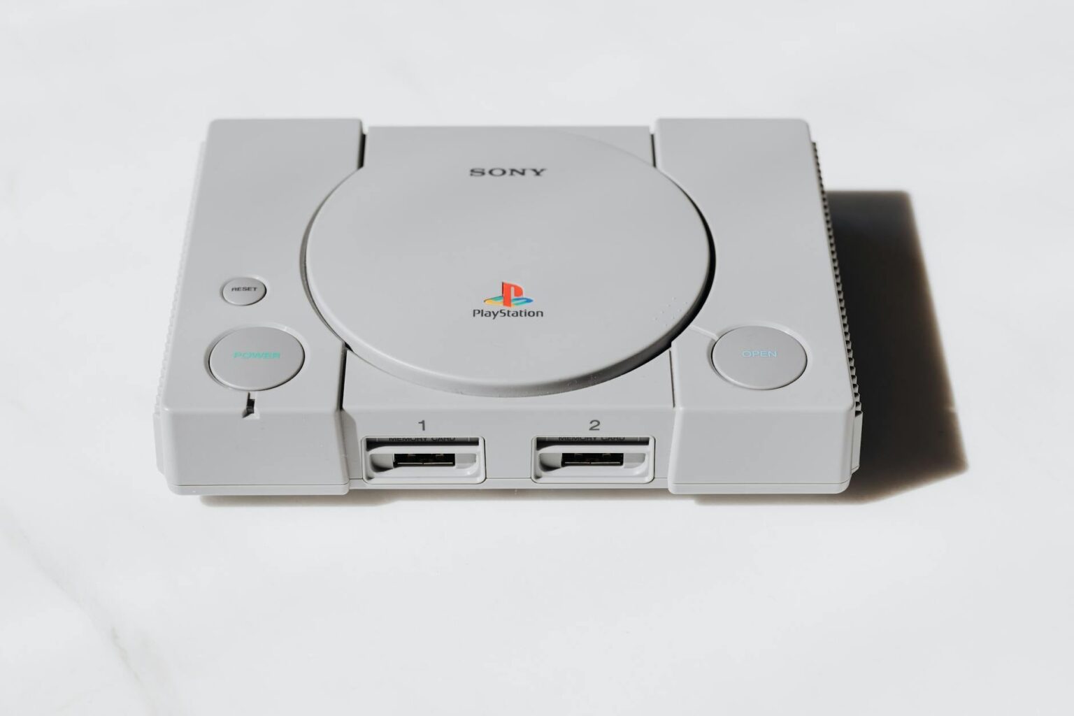 A classic retro gaming console on a flat surface, representing older Nintendo hardware generations