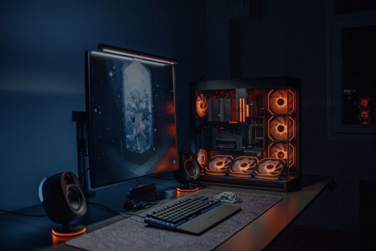Halo Studios’ Engine Switch to Unreal Is Alarming Longtime Modders A dark gaming setup with multiple monitors, representing the Halo modding community's workstation environment