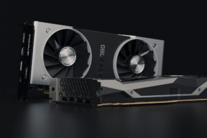 Intel’s Arc GPU Push Is Finally Threatening NVIDIA’s Budget Stranglehold A modern graphics card displayed on a dark surface highlighting its cooling design